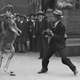 Some old timey dude preparing to lose a fight to a kangaroo in London in 1931.
